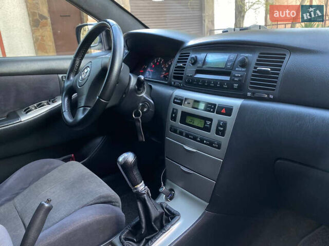 Серый Тойота Королла, объемом двигателя 2 л и пробегом 328 тыс. км за 4350 $, фото 8 на Automoto.ua