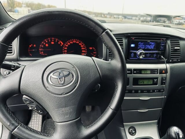 Сірий Тойота Королла, об'ємом двигуна 1.8 л та пробігом 214 тис. км за 4099 $, фото 9 на Automoto.ua