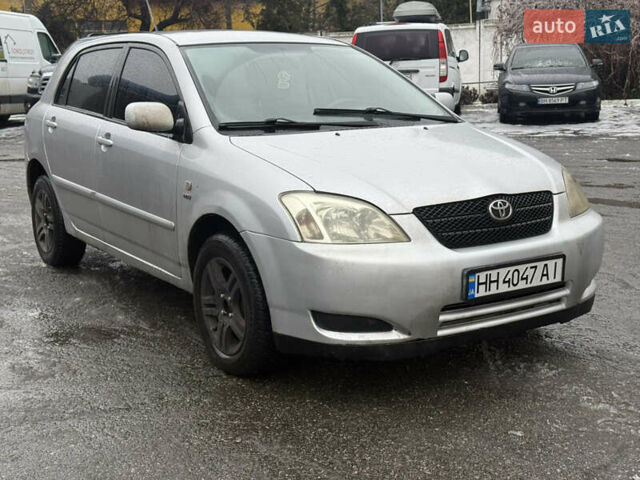 Серый Тойота Королла, объемом двигателя 1.4 л и пробегом 302 тыс. км за 3999 $, фото 2 на Automoto.ua