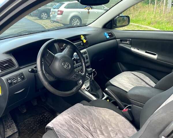 Серый Тойота Королла, объемом двигателя 1.4 л и пробегом 260 тыс. км за 5450 $, фото 6 на Automoto.ua