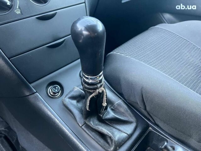 Серый Тойота Королла, объемом двигателя 1.6 л и пробегом 270 тыс. км за 4490 $, фото 26 на Automoto.ua