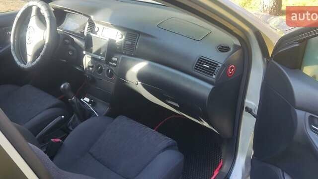 Серый Тойота Королла, объемом двигателя 1.4 л и пробегом 236 тыс. км за 4900 $, фото 11 на Automoto.ua