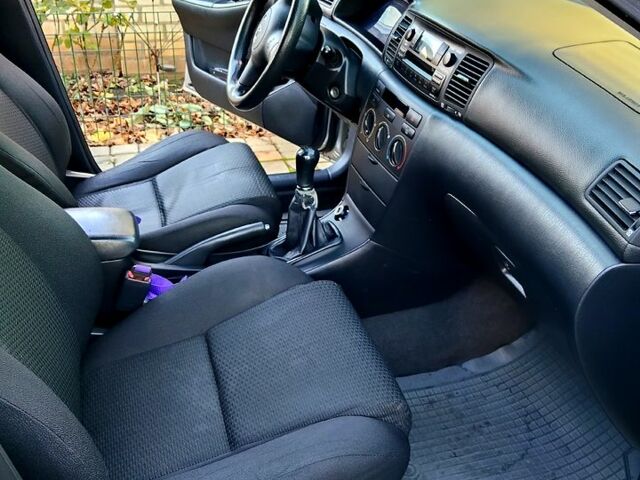 Серый Тойота Королла, объемом двигателя 1.4 л и пробегом 253 тыс. км за 6000 $, фото 12 на Automoto.ua