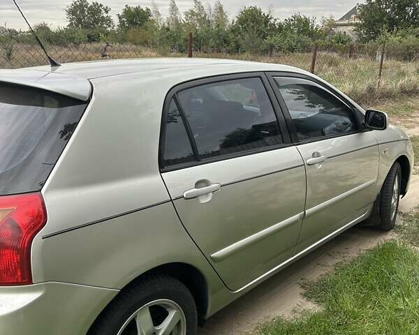Сірий Тойота Королла, об'ємом двигуна 1.6 л та пробігом 241 тис. км за 4600 $, фото 4 на Automoto.ua