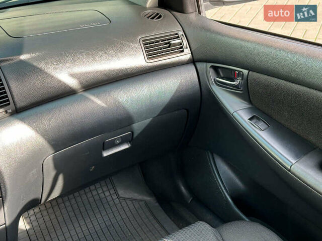 Серый Тойота Королла, объемом двигателя 1.4 л и пробегом 252 тыс. км за 6490 $, фото 16 на Automoto.ua