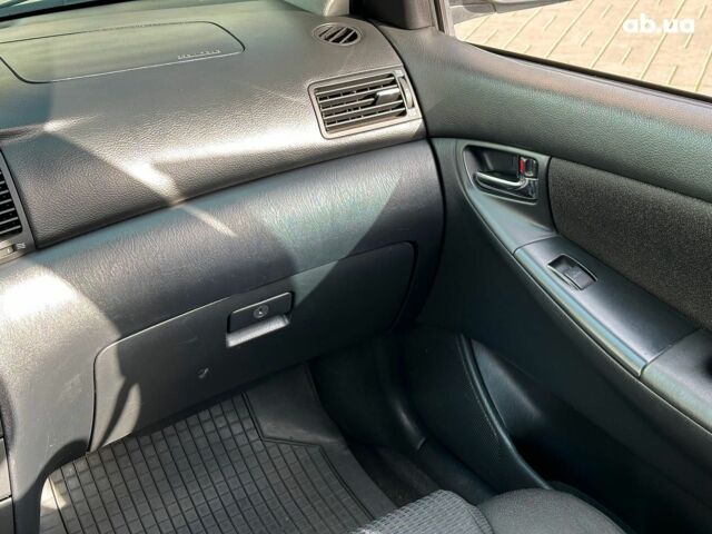 Серый Тойота Королла, объемом двигателя 1.4 л и пробегом 252 тыс. км за 6490 $, фото 16 на Automoto.ua