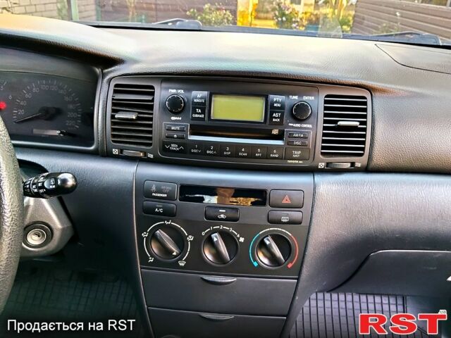 Серый Тойота Королла, объемом двигателя 1.4 л и пробегом 253 тыс. км за 6000 $, фото 6 на Automoto.ua