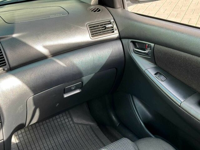 Серый Тойота Королла, объемом двигателя 1.4 л и пробегом 252 тыс. км за 6490 $, фото 16 на Automoto.ua