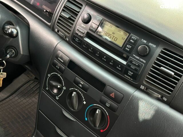 Серый Тойота Королла, объемом двигателя 1.4 л и пробегом 252 тыс. км за 6490 $, фото 21 на Automoto.ua