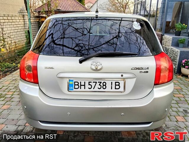 Серый Тойота Королла, объемом двигателя 1.4 л и пробегом 253 тыс. км за 6000 $, фото 1 на Automoto.ua