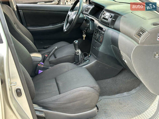 Серый Тойота Королла, объемом двигателя 1.4 л и пробегом 252 тыс. км за 6490 $, фото 18 на Automoto.ua