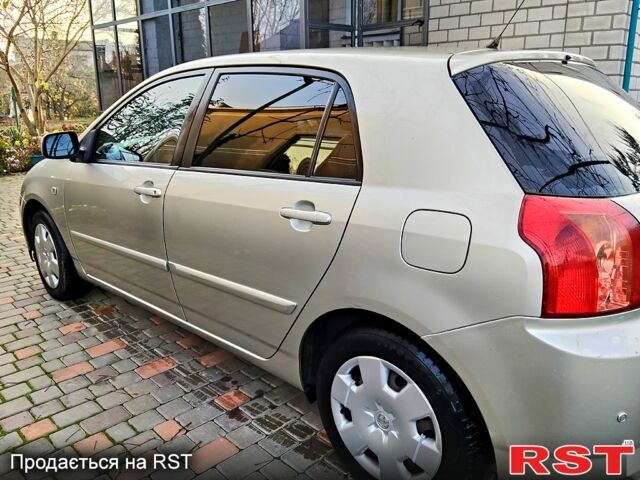 Серый Тойота Королла, объемом двигателя 1.4 л и пробегом 253 тыс. км за 6000 $, фото 2 на Automoto.ua