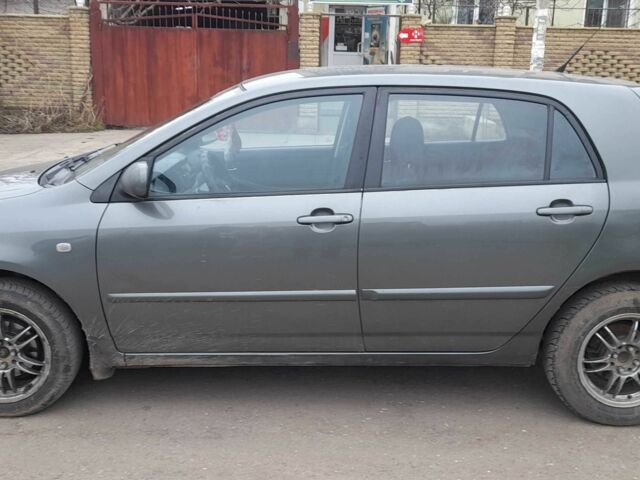 Серый Тойота Королла, объемом двигателя 1.6 л и пробегом 265 тыс. км за 5200 $, фото 1 на Automoto.ua