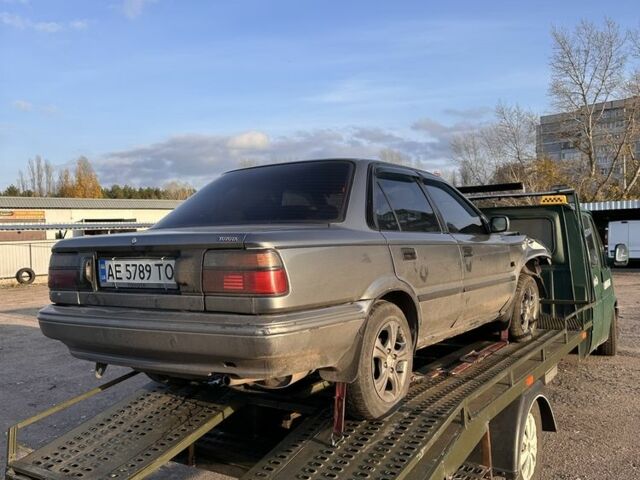 Серый Тойота Королла, объемом двигателя 1.6 л и пробегом 235 тыс. км за 650 $, фото 2 на Automoto.ua