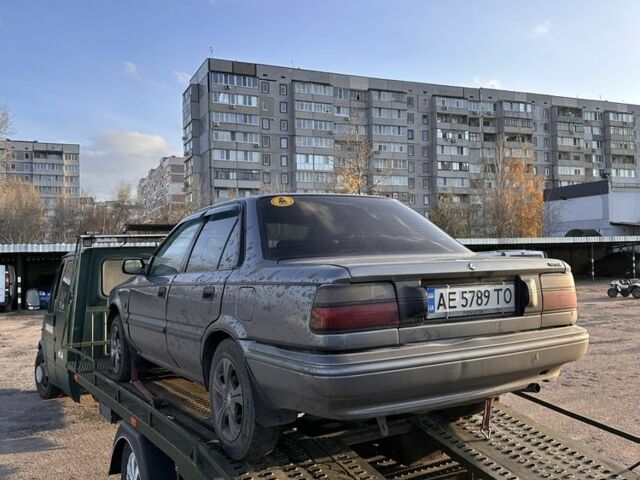 Серый Тойота Королла, объемом двигателя 1.6 л и пробегом 235 тыс. км за 650 $, фото 3 на Automoto.ua