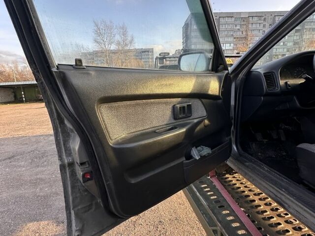 Серый Тойота Королла, объемом двигателя 1.6 л и пробегом 235 тыс. км за 650 $, фото 7 на Automoto.ua