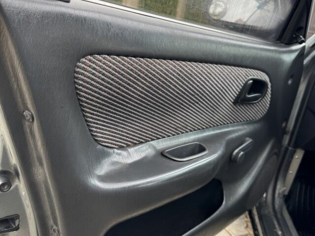 Серый Тойота Королла, объемом двигателя 1.4 л и пробегом 258 тыс. км за 1300 $, фото 10 на Automoto.ua