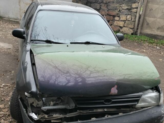 Серый Тойота Королла, объемом двигателя 1.3 л и пробегом 250 тыс. км за 500 $, фото 3 на Automoto.ua