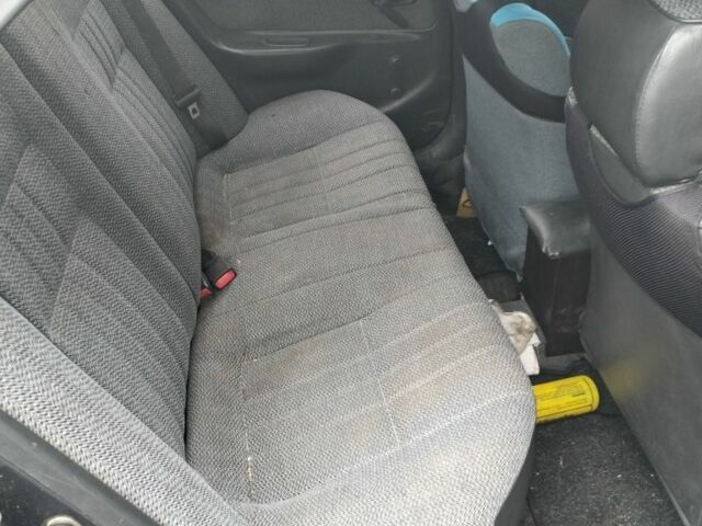 Серый Тойота Королла, объемом двигателя 1.3 л и пробегом 250 тыс. км за 500 $, фото 6 на Automoto.ua