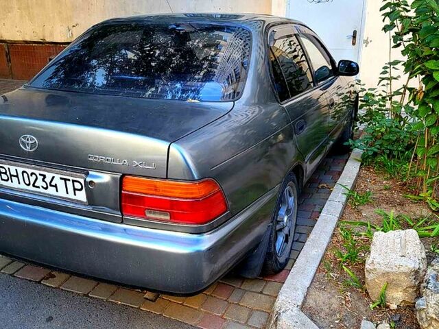 Серый Тойота Королла, объемом двигателя 1.3 л и пробегом 240 тыс. км за 2500 $, фото 3 на Automoto.ua