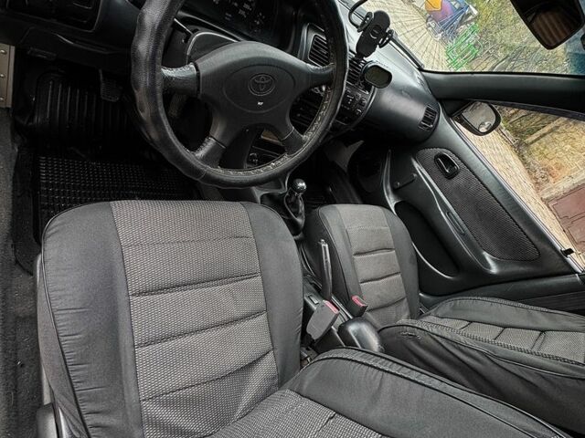 Серый Тойота Королла, объемом двигателя 1.4 л и пробегом 258 тыс. км за 1300 $, фото 7 на Automoto.ua