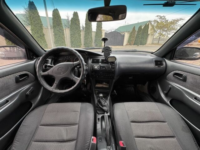 Серый Тойота Королла, объемом двигателя 1.4 л и пробегом 258 тыс. км за 1300 $, фото 6 на Automoto.ua