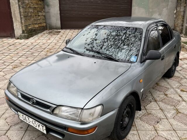 Серый Тойота Королла, объемом двигателя 1.4 л и пробегом 258 тыс. км за 1300 $, фото 2 на Automoto.ua