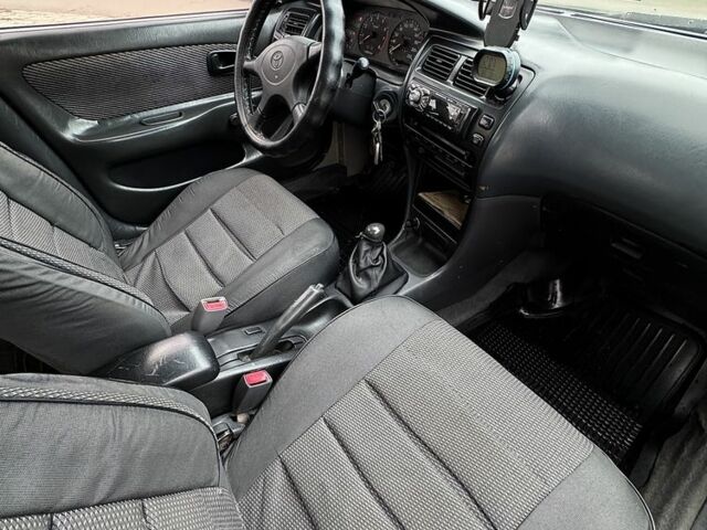 Серый Тойота Королла, объемом двигателя 1.4 л и пробегом 258 тыс. км за 1300 $, фото 8 на Automoto.ua