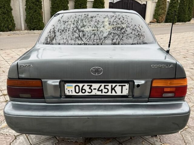 Серый Тойота Королла, объемом двигателя 1.4 л и пробегом 258 тыс. км за 1300 $, фото 4 на Automoto.ua