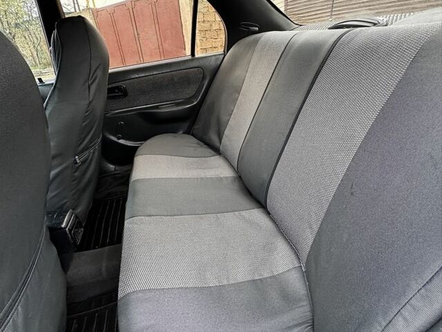 Серый Тойота Королла, объемом двигателя 1.4 л и пробегом 258 тыс. км за 1300 $, фото 9 на Automoto.ua