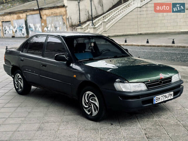 Серый Тойота Королла, объемом двигателя 1.33 л и пробегом 300 тыс. км за 950 $, фото 2 на Automoto.ua