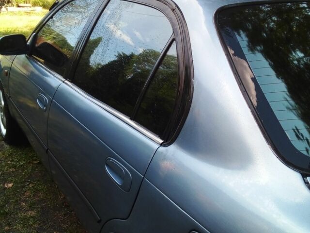 Серый Тойота Королла, объемом двигателя 1.3 л и пробегом 280 тыс. км за 2000 $, фото 2 на Automoto.ua