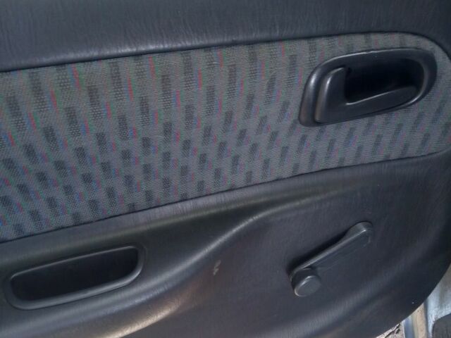 Серый Тойота Королла, объемом двигателя 1.3 л и пробегом 280 тыс. км за 2000 $, фото 6 на Automoto.ua