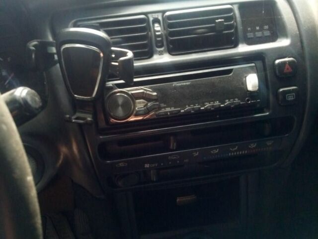 Серый Тойота Королла, объемом двигателя 1.3 л и пробегом 280 тыс. км за 2000 $, фото 7 на Automoto.ua