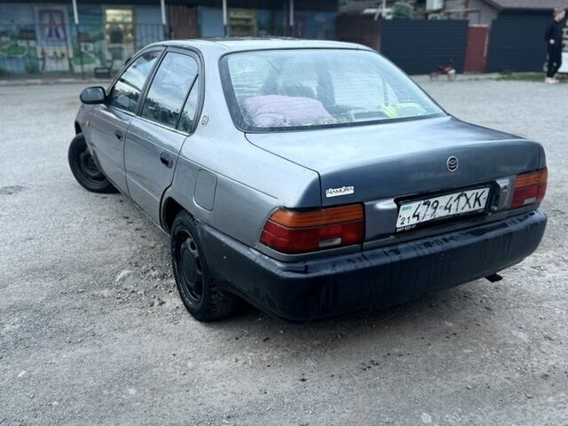 Серый Тойота Королла, объемом двигателя 1.6 л и пробегом 215 тыс. км за 1200 $, фото 1 на Automoto.ua