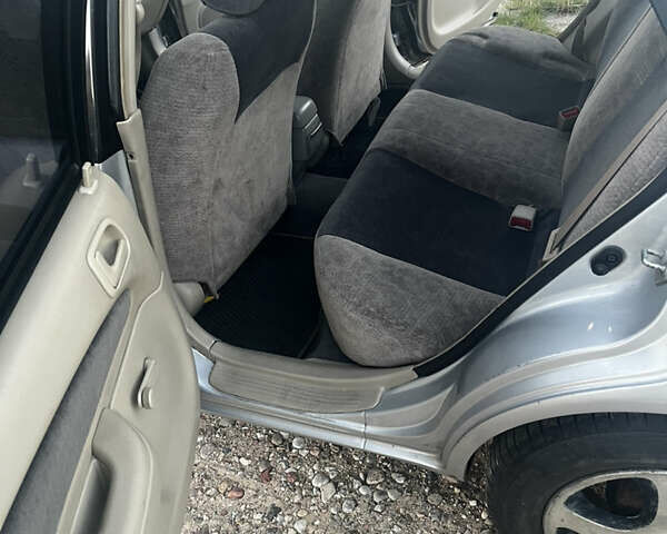 Серый Тойота Королла, объемом двигателя 1.6 л и пробегом 390 тыс. км за 2000 $, фото 6 на Automoto.ua