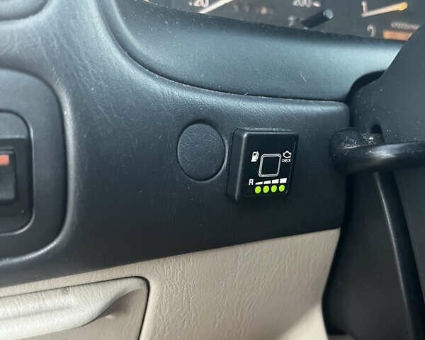 Серый Тойота Королла, объемом двигателя 1.6 л и пробегом 390 тыс. км за 2000 $, фото 9 на Automoto.ua