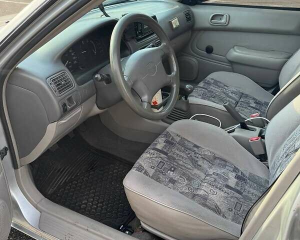 Серый Тойота Королла, объемом двигателя 1.4 л и пробегом 211 тыс. км за 3200 $, фото 5 на Automoto.ua