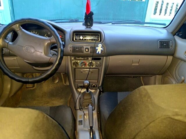 Серый Тойота Королла, объемом двигателя 1.3 л и пробегом 450 тыс. км за 2200 $, фото 8 на Automoto.ua