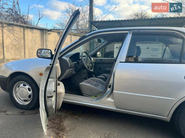 Сірий Тойота Королла, об'ємом двигуна 1.33 л та пробігом 210 тис. км за 3500 $, фото 1 на Automoto.ua