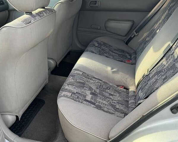 Серый Тойота Королла, объемом двигателя 1.4 л и пробегом 211 тыс. км за 3200 $, фото 2 на Automoto.ua