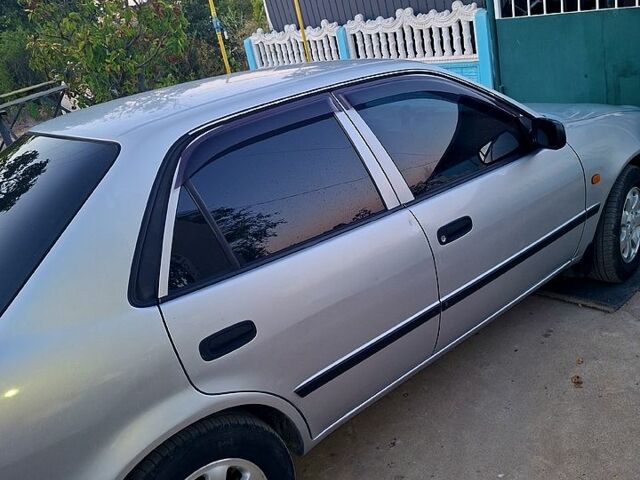 Серый Тойота Королла, объемом двигателя 1.3 л и пробегом 450 тыс. км за 2200 $, фото 1 на Automoto.ua