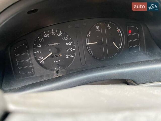 Серый Тойота Королла, объемом двигателя 1.4 л и пробегом 388 тыс. км за 2700 $, фото 4 на Automoto.ua