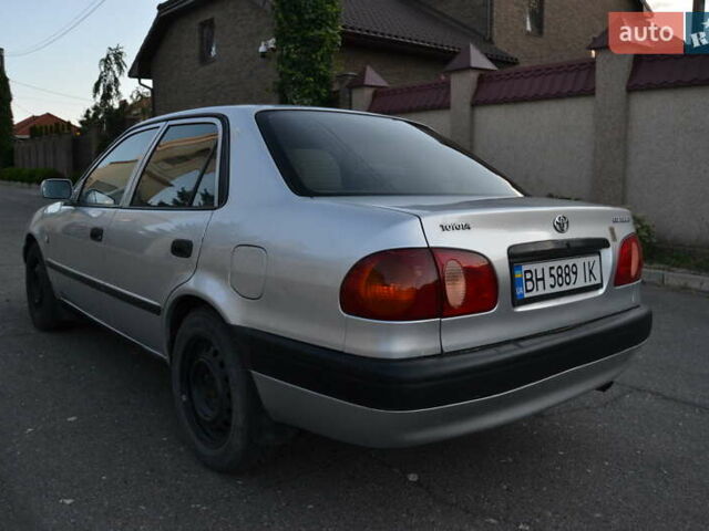 Серый Тойота Королла, объемом двигателя 1.4 л и пробегом 320 тыс. км за 2400 $, фото 4 на Automoto.ua