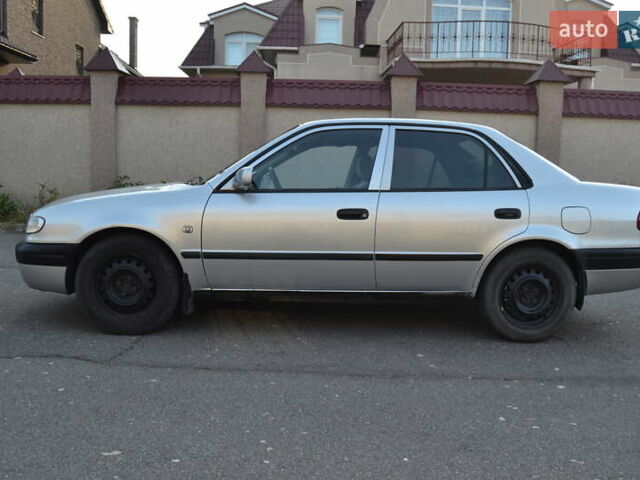 Серый Тойота Королла, объемом двигателя 1.4 л и пробегом 320 тыс. км за 2400 $, фото 3 на Automoto.ua