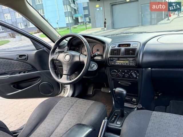 Сірий Тойота Королла, об'ємом двигуна 1.8 л та пробігом 240 тис. км за 4600 $, фото 19 на Automoto.ua