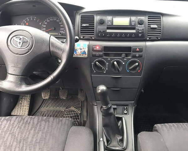 Серый Тойота Королла, объемом двигателя 1.4 л и пробегом 275 тыс. км за 4500 $, фото 6 на Automoto.ua