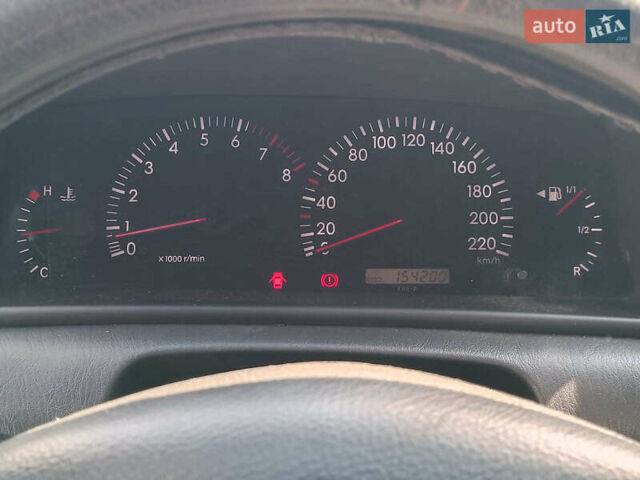 Серый Тойота Королла, объемом двигателя 1.6 л и пробегом 154 тыс. км за 4240 $, фото 19 на Automoto.ua