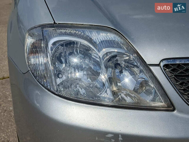 Серый Тойота Королла, объемом двигателя 1.6 л и пробегом 154 тыс. км за 4240 $, фото 3 на Automoto.ua