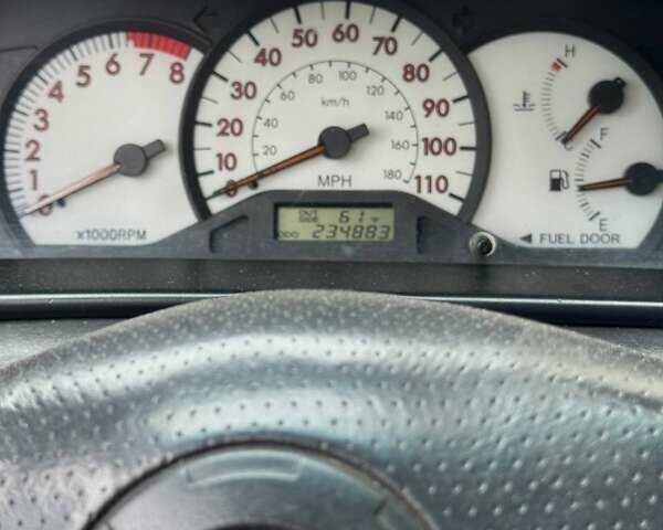 Серый Тойота Королла, объемом двигателя 1.8 л и пробегом 234 тыс. км за 4200 $, фото 5 на Automoto.ua